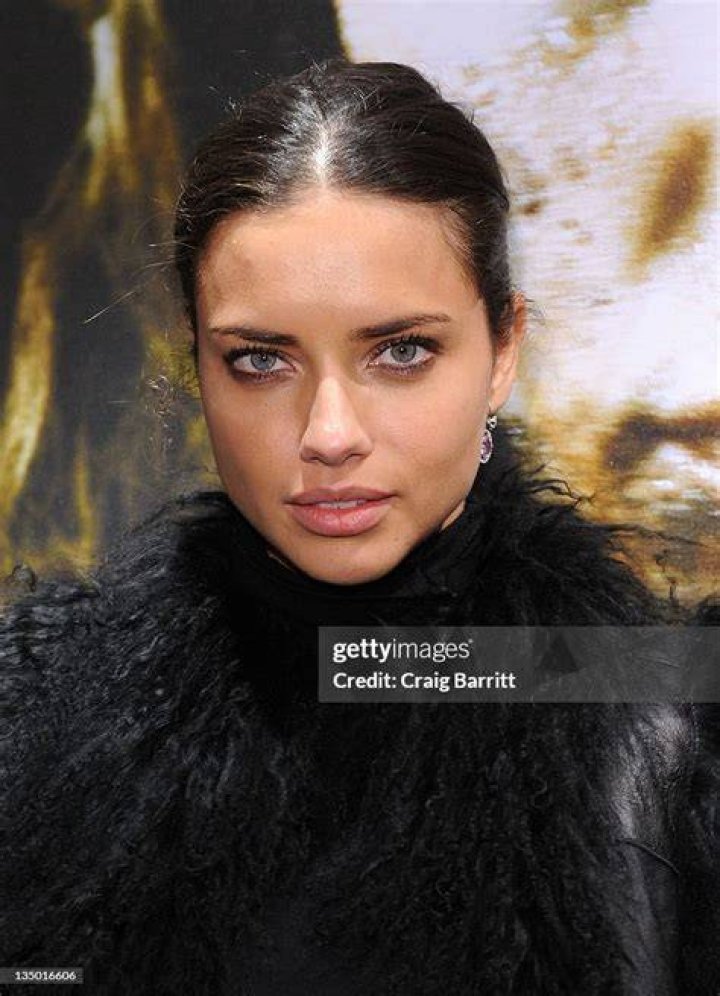 Adriana Lima attends the Nomad Two Worlds Russell James Exhibit Opening