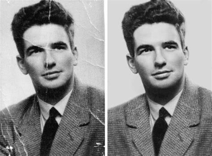 an old black and white photo of a man in a suit