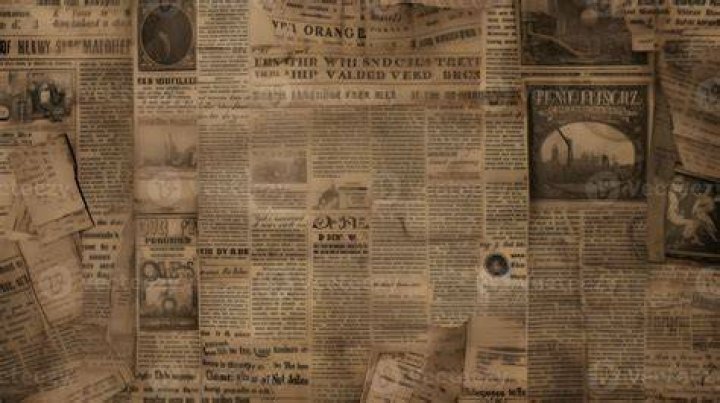 an old newspaper with a man's face on it