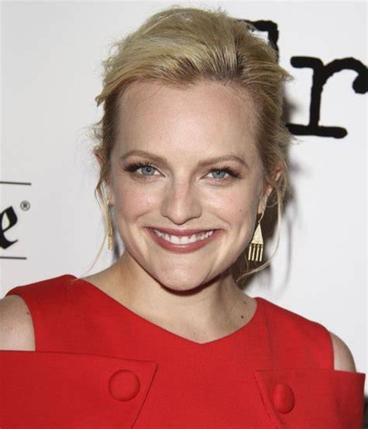 Elisabeth Moss stuns in a mini dress at The Bleeder premiere in Toronto
