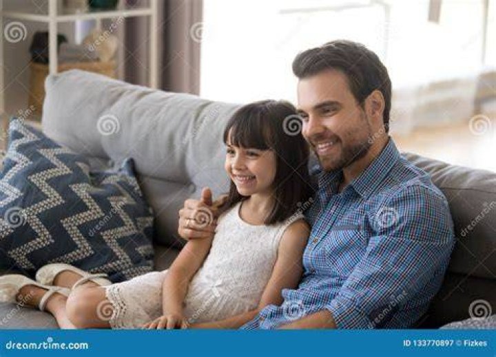 Father Embrace Daughter Sitting Together on Couch Stock Image Image