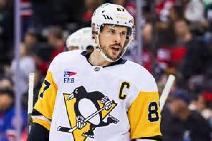 Sidney Crosby, NHL, Pittsburgh Penguins. He's so cute when holding that