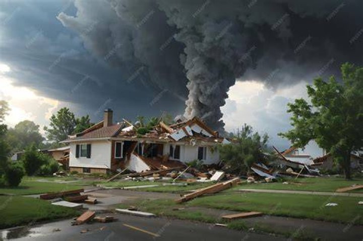 Violent Tornado in Destroys One Side of a Street, Spares the